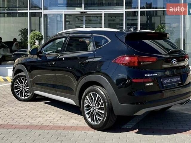 Черный Хендай Туксон, объемом двигателя 2.36 л и пробегом 53 тыс. км за 19500 $, фото 7 на Automoto.ua