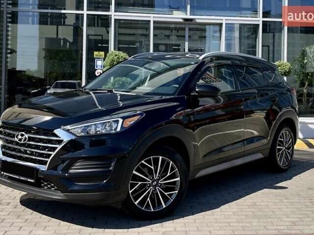 Черный Хендай Туксон, объемом двигателя 2.36 л и пробегом 53 тыс. км за 19500 $, фото 6 на Automoto.ua
