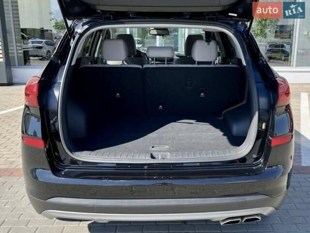 Черный Хендай Туксон, объемом двигателя 2.36 л и пробегом 53 тыс. км за 19500 $, фото 9 на Automoto.ua