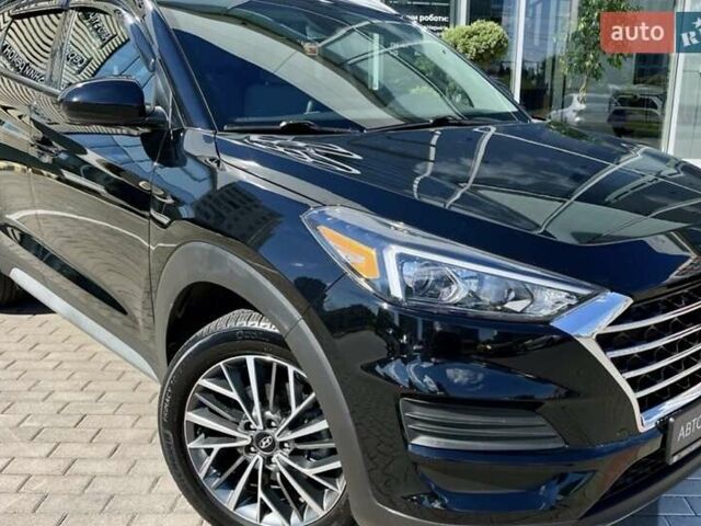 Черный Хендай Туксон, объемом двигателя 2.36 л и пробегом 53 тыс. км за 19500 $, фото 1 на Automoto.ua