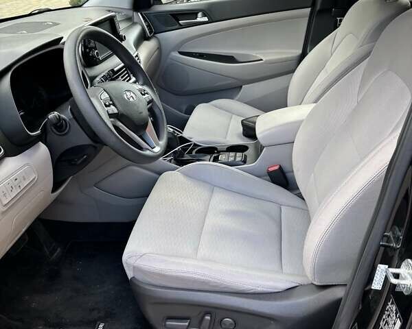 Черный Хендай Туксон, объемом двигателя 2.36 л и пробегом 53 тыс. км за 19500 $, фото 21 на Automoto.ua