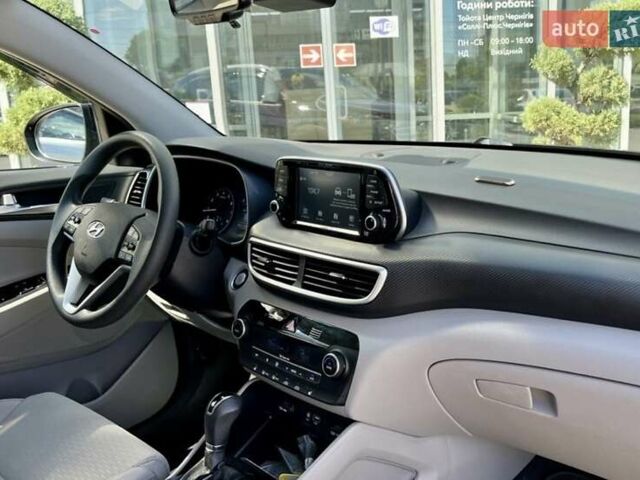 Черный Хендай Туксон, объемом двигателя 2.36 л и пробегом 53 тыс. км за 19500 $, фото 12 на Automoto.ua