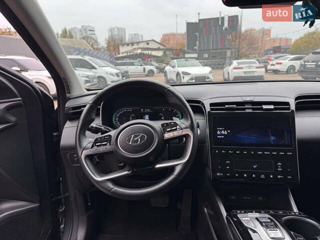 Черный Хендай Туксон, объемом двигателя 2 л и пробегом 107 тыс. км за 28900 $, фото 7 на Automoto.ua