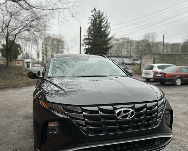 Черный Хендай Туксон, объемом двигателя 2.49 л и пробегом 73 тыс. км за 22300 $, фото 1 на Automoto.ua