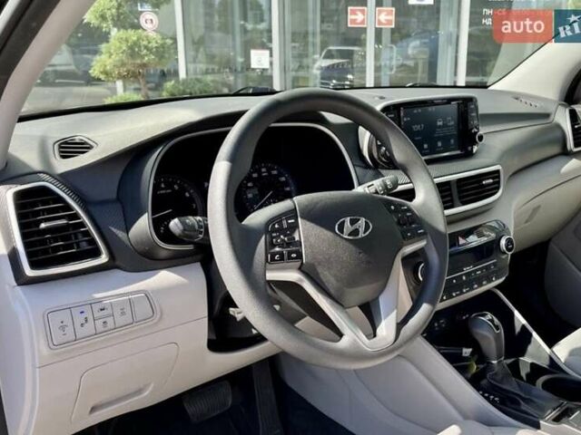 Черный Хендай Туксон, объемом двигателя 2.36 л и пробегом 53 тыс. км за 19500 $, фото 13 на Automoto.ua