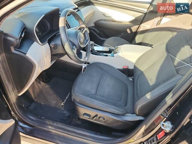 Черный Хендай Туксон, объемом двигателя 2.5 л и пробегом 122 тыс. км за 5700 $, фото 6 на Automoto.ua