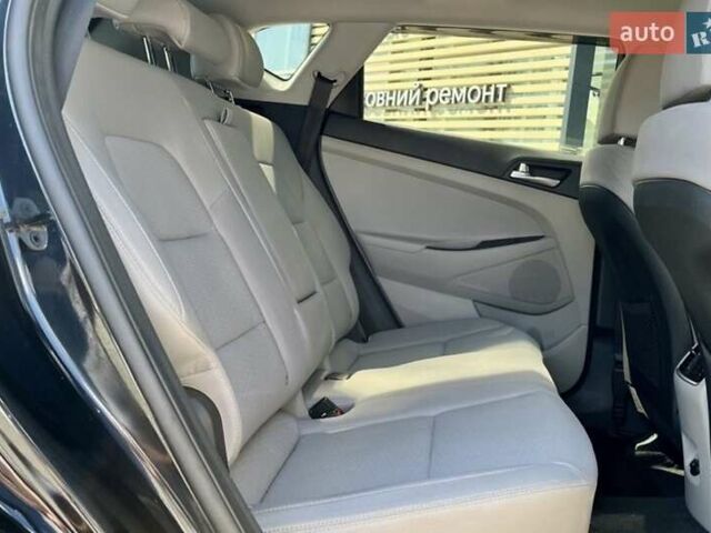 Черный Хендай Туксон, объемом двигателя 2.36 л и пробегом 53 тыс. км за 19500 $, фото 11 на Automoto.ua