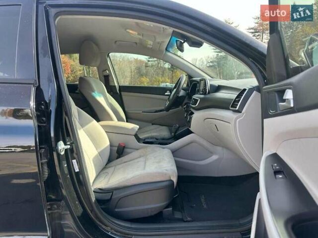 Черный Хендай Туксон, объемом двигателя 2 л и пробегом 125 тыс. км за 4300 $, фото 5 на Automoto.ua