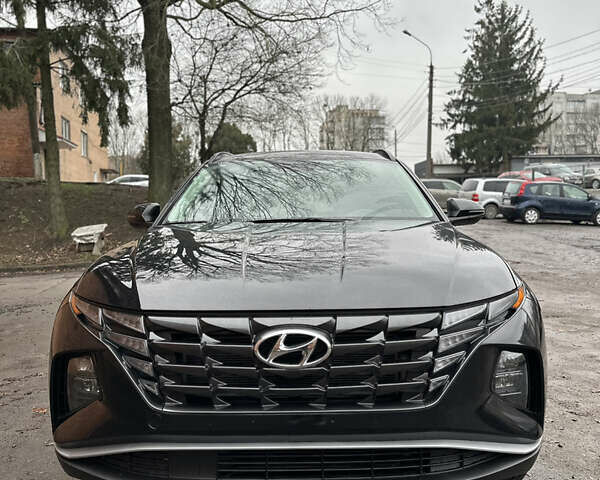 Черный Хендай Туксон, объемом двигателя 2.49 л и пробегом 73 тыс. км за 22300 $, фото 2 на Automoto.ua