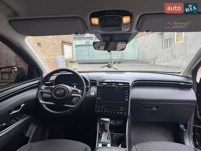 Черный Хендай Туксон, объемом двигателя 2 л и пробегом 131 тыс. км за 23500 $, фото 12 на Automoto.ua