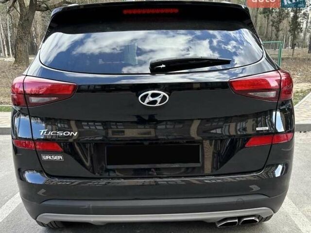 Черный Хендай Туксон, объемом двигателя 2.36 л и пробегом 53 тыс. км за 19500 $, фото 8 на Automoto.ua