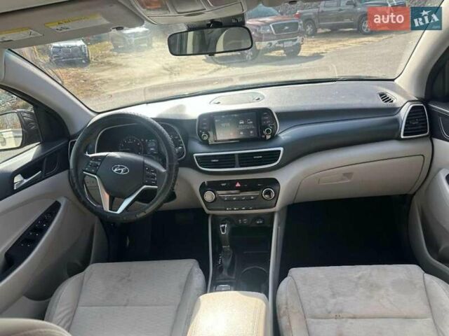 Черный Хендай Туксон, объемом двигателя 2 л и пробегом 125 тыс. км за 4300 $, фото 6 на Automoto.ua