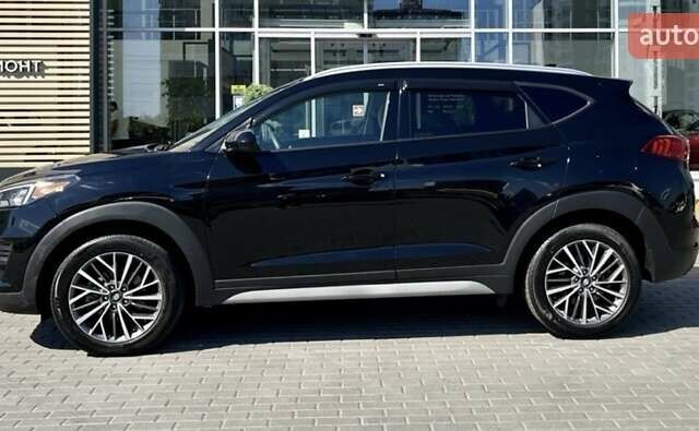 Черный Хендай Туксон, объемом двигателя 2.36 л и пробегом 53 тыс. км за 19500 $, фото 3 на Automoto.ua