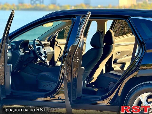 Черный Хендай Туксон, объемом двигателя 2.5 л и пробегом 115 тыс. км за 24999 $, фото 6 на Automoto.ua