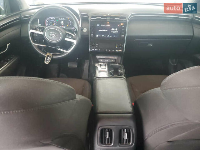 Черный Хендай Туксон, объемом двигателя 1.6 л и пробегом 204 тыс. км за 8100 $, фото 7 на Automoto.ua