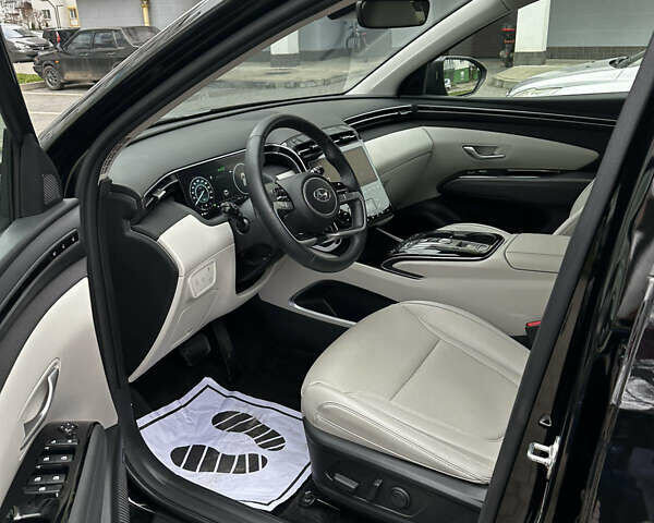 Черный Хендай Туксон, объемом двигателя 1.6 л и пробегом 43 тыс. км за 29950 $, фото 5 на Automoto.ua