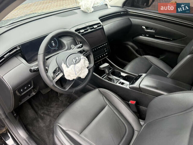 Черный Хендай Туксон, объемом двигателя 2.5 л и пробегом 81 тыс. км за 14900 $, фото 10 на Automoto.ua