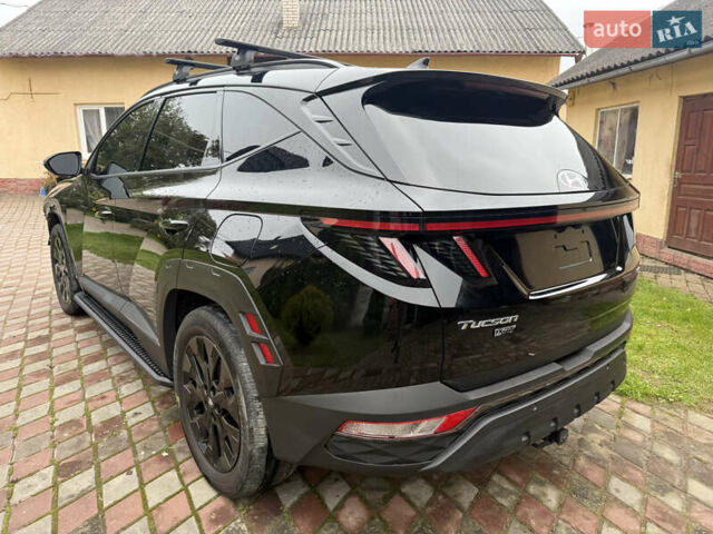 Черный Хендай Туксон, объемом двигателя 2.5 л и пробегом 81 тыс. км за 14900 $, фото 3 на Automoto.ua