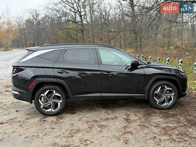 Черный Хендай Туксон, объемом двигателя 1.6 л и пробегом 40 тыс. км за 36000 $, фото 4 на Automoto.ua