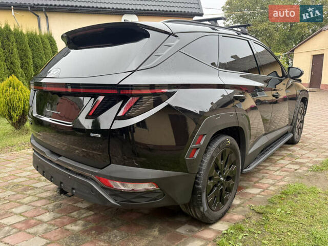 Черный Хендай Туксон, объемом двигателя 2.5 л и пробегом 81 тыс. км за 14900 $, фото 5 на Automoto.ua