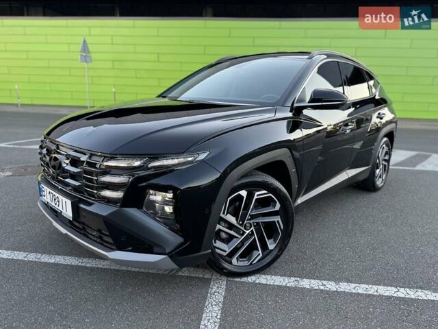 Черный Хендай Туксон, объемом двигателя 2 л и пробегом 55 тыс. км за 33900 $, фото 4 на Automoto.ua