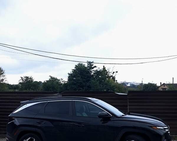 Черный Хендай Туксон, объемом двигателя 1.6 л и пробегом 37 тыс. км за 40000 $, фото 7 на Automoto.ua