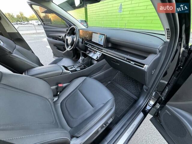 Черный Хендай Туксон, объемом двигателя 2 л и пробегом 55 тыс. км за 33900 $, фото 51 на Automoto.ua