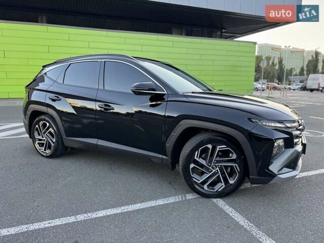 Черный Хендай Туксон, объемом двигателя 2 л и пробегом 55 тыс. км за 33900 $, фото 13 на Automoto.ua