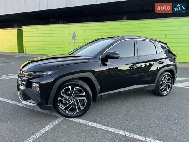 Черный Хендай Туксон, объемом двигателя 2 л и пробегом 55 тыс. км за 33900 $, фото 3 на Automoto.ua