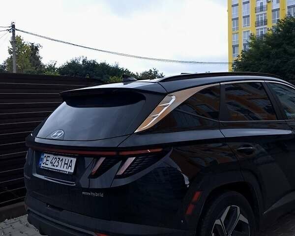 Черный Хендай Туксон, объемом двигателя 1.6 л и пробегом 37 тыс. км за 40000 $, фото 6 на Automoto.ua