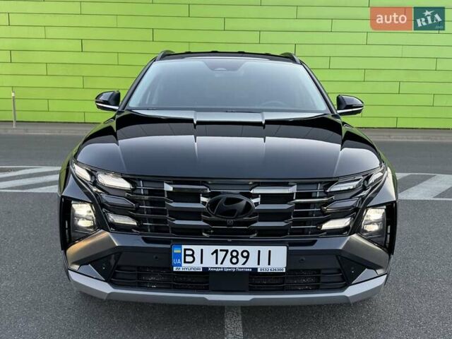 Черный Хендай Туксон, объемом двигателя 2 л и пробегом 55 тыс. км за 33900 $, фото 6 на Automoto.ua