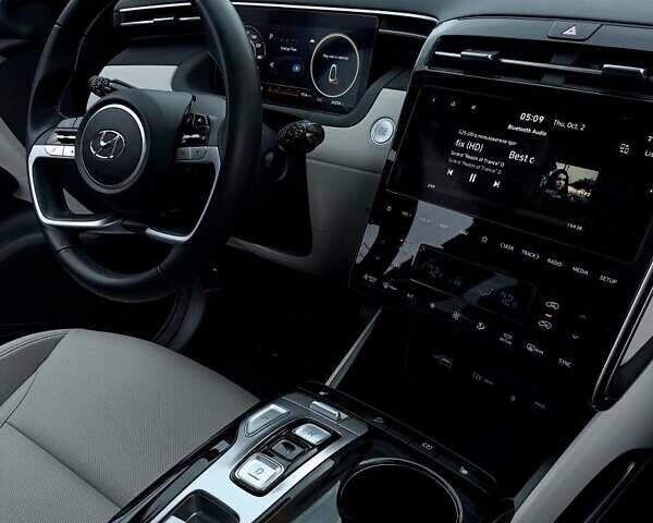 Черный Хендай Туксон, объемом двигателя 1.6 л и пробегом 37 тыс. км за 40000 $, фото 2 на Automoto.ua