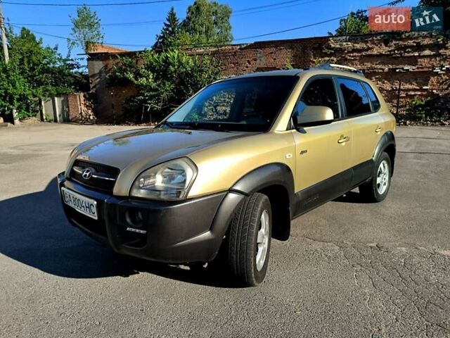 Коричневый Хендай Туксон, объемом двигателя 2 л и пробегом 137 тыс. км за 7500 $, фото 2 на Automoto.ua