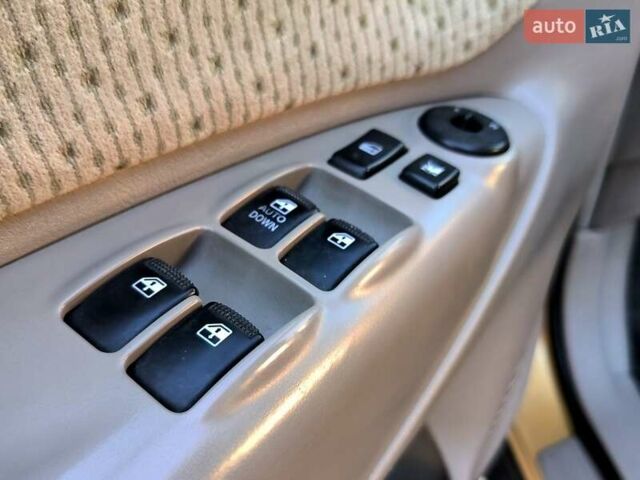 Коричневый Хендай Туксон, объемом двигателя 2 л и пробегом 137 тыс. км за 7500 $, фото 9 на Automoto.ua