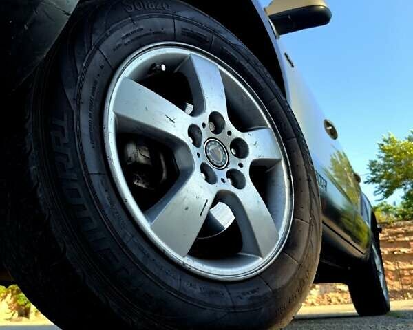 Коричневый Хендай Туксон, объемом двигателя 2 л и пробегом 137 тыс. км за 7500 $, фото 19 на Automoto.ua