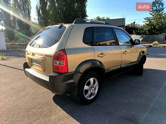 Коричневый Хендай Туксон, объемом двигателя 2 л и пробегом 137 тыс. км за 7500 $, фото 1 на Automoto.ua