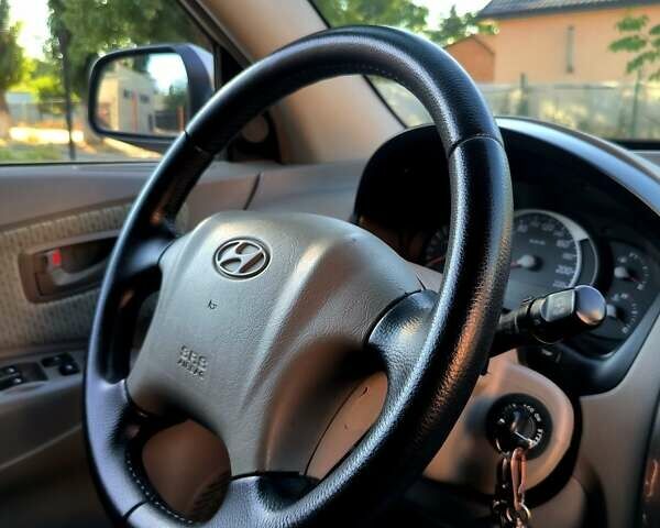 Коричневый Хендай Туксон, объемом двигателя 2 л и пробегом 137 тыс. км за 7500 $, фото 18 на Automoto.ua