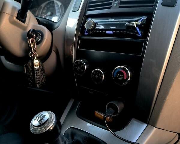 Коричневый Хендай Туксон, объемом двигателя 2 л и пробегом 137 тыс. км за 7500 $, фото 17 на Automoto.ua