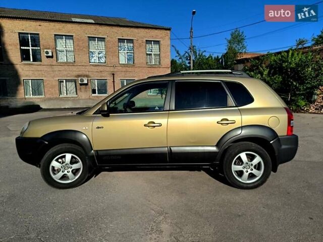Коричневый Хендай Туксон, объемом двигателя 2 л и пробегом 137 тыс. км за 7500 $, фото 6 на Automoto.ua