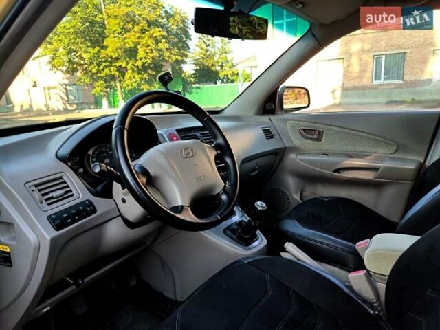 Коричневый Хендай Туксон, объемом двигателя 2 л и пробегом 137 тыс. км за 7500 $, фото 8 на Automoto.ua
