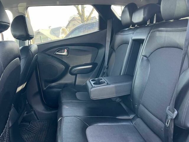 Коричневый Хендай Туксон, объемом двигателя 2.4 л и пробегом 170 тыс. км за 10700 $, фото 18 на Automoto.ua