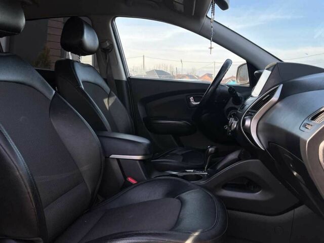 Коричневый Хендай Туксон, объемом двигателя 2.4 л и пробегом 170 тыс. км за 10700 $, фото 19 на Automoto.ua