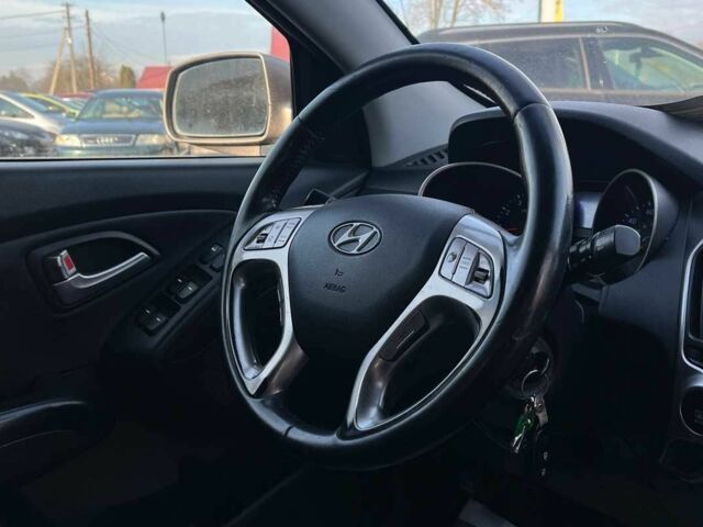 Коричневый Хендай Туксон, объемом двигателя 2.4 л и пробегом 170 тыс. км за 10700 $, фото 15 на Automoto.ua