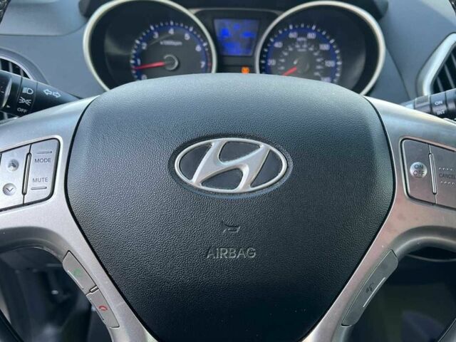 Коричневый Хендай Туксон, объемом двигателя 2.4 л и пробегом 170 тыс. км за 10700 $, фото 12 на Automoto.ua