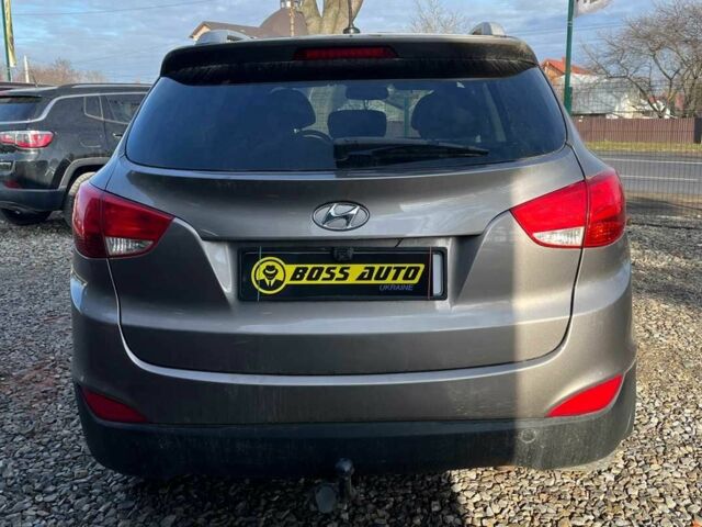 Коричневый Хендай Туксон, объемом двигателя 2.4 л и пробегом 170 тыс. км за 10700 $, фото 6 на Automoto.ua