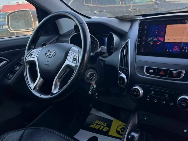 Коричневый Хендай Туксон, объемом двигателя 2.4 л и пробегом 170 тыс. км за 10700 $, фото 16 на Automoto.ua