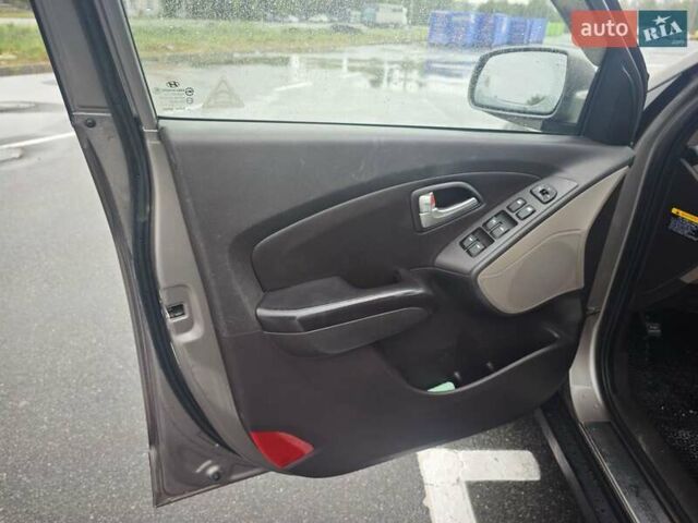 Коричневый Хендай Туксон, объемом двигателя 2.4 л и пробегом 148 тыс. км за 11700 $, фото 21 на Automoto.ua