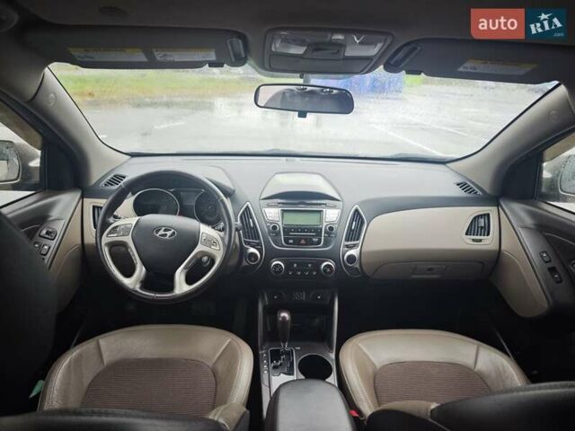 Коричневый Хендай Туксон, объемом двигателя 2.4 л и пробегом 148 тыс. км за 11700 $, фото 22 на Automoto.ua