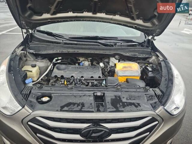 Коричневый Хендай Туксон, объемом двигателя 2.4 л и пробегом 148 тыс. км за 11700 $, фото 28 на Automoto.ua