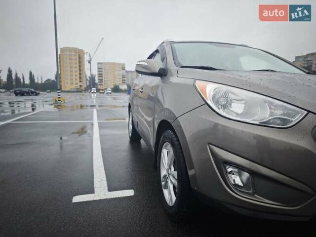 Коричневый Хендай Туксон, объемом двигателя 2.4 л и пробегом 148 тыс. км за 11700 $, фото 12 на Automoto.ua